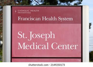 Tacoma, WA, USA - April 23, 2022; Sign For St Joseph Medical Center In Tacoma Washington.  The Hospital Is A Part Of The Franciscan Health System And Catholic Health Initiative