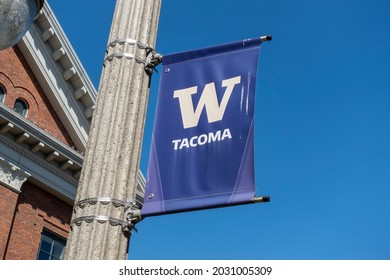 Tacoma, WA USA - circa August 2021: Low angle view of a University of Washington Tacoma banner on a light post on the city campus grounds