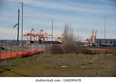 Tacoma, Washington, USA - 3/19/2019 Port Of Tacoma Operations Cranes Trucks Rail