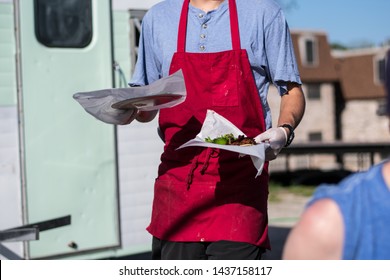 Tacos Being Served On A Taco Truck