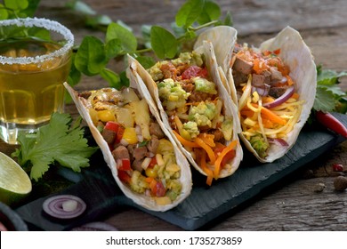 Tacos With Different Fillings And Tequila