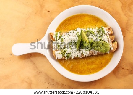 Tacos dorados, golden tacos or chicken flautas, typical Mexican food