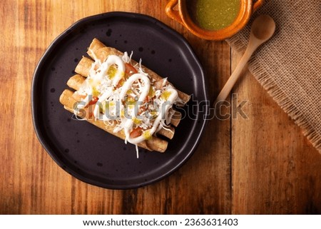 Tacos Dorados. Mexican dish also known as Flautas, consists of a rolled corn tortilla with some filling, commonly chicken or beef or vegetarian options such as potatoes.