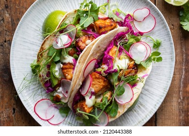 Tacos With Salmon, Pickled Red Cabbage, Wasabi Mayo And Pea Shoots