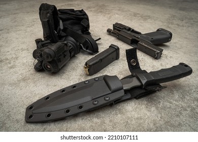 Tactical Equipment, Army Knife, Night Vision Goggles And Pistol.