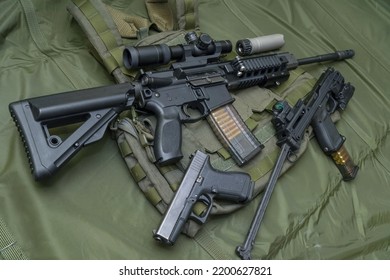 Tactical Equipment And Firearms.  Pistol, Rifle With Optical Sight And Pistol Conversion Kit.