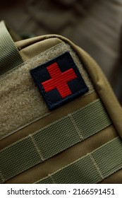 Tactical Military First Aid Kit With Red Cross Chevron Close Up 