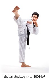 Taekwondo Action Isolated By A Young Man