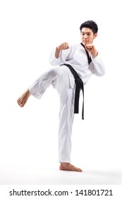 Taekwondo Action Isolated By A Young Man