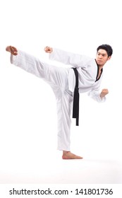 Taekwondo Action Isolated By A Young Man