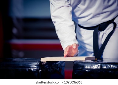 Taekwondo Master Breaking Wooden Board