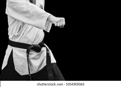 Taekwondo Traditional Korean Male Fighter Punch Fist Isolated On Black