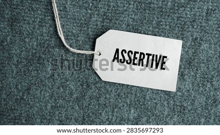 Tag the paper with the word assertive. behaving with confidence and stating your opinions, needs, or beliefs in a direct and clear way.