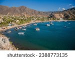 Taganga is a picturesque fishing village located on the Caribbean coast of Colombia, near the city of Santa Marta