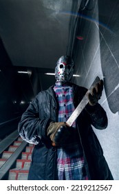 Taganrog, Russia - November 7 2021 
Jason Voorhees From Friday The 13th Stand With Machete In Underpass