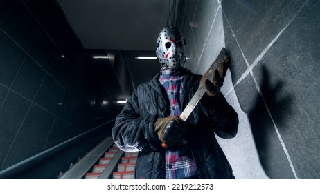 Taganrog, Russia - November 7 2021 
Jason Voorhees From Friday The 13th Stand With Machete In Underpass