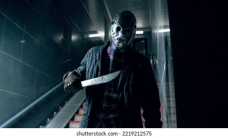 Taganrog, Russia - November 7 2021 
Jason Voorhees From Friday The 13th Stand With Machete In Underpass