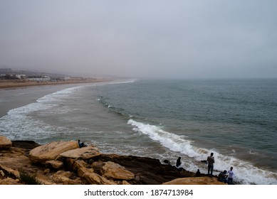 Taghazout, Morroco, Africa - April 30, 2019: The Beach Under A Cloudy Sky