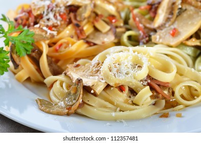 Tagliatelle with boletus and bacon sauce
