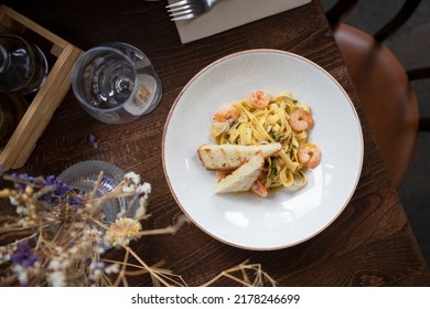 Tagliatelle Pasta In Creamy Garlic Sauce With Shrimp Close-up