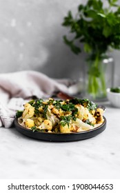 Tahini Roasted Cauliflower With Herb Vinaigrette That Has Tender, Caramelized Roasted Cauliflower Florets With Toasted Pine Nuts, A Creamy Tahini Sauce, And A Vinaigrette Full Of Fresh Herbs.