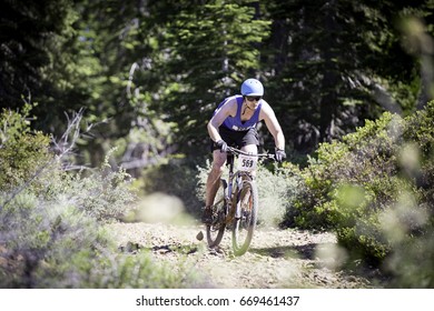 Tahoe City, CA, USA - June 24, 2017: Aaron Smith From Reno Bikes The Trails At XTERRA Tahoe City.