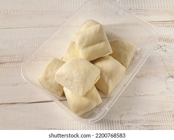 Tahu Putih Or Tofu In Plastic Container Isolated Against White Wooden Background. Copy Space Available. 