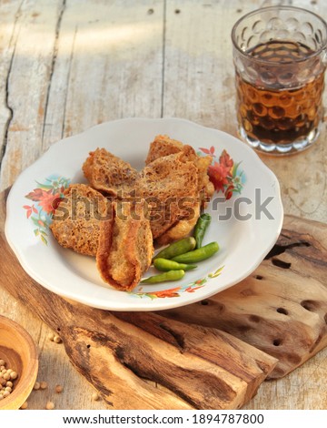 Tahu walik, from Banyuwangi, East Java, Indonesia. Tofu walik usually fried with tapioca filling or other ingredients in it. Given the name walik because the way to process it is to reverse it first.