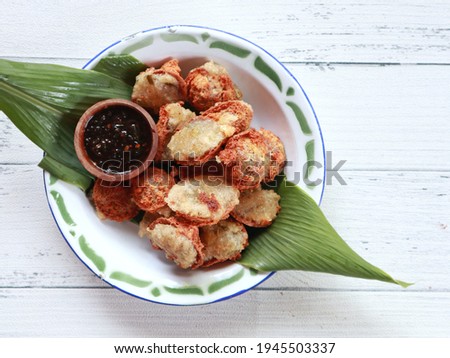 Tahu Walik or inside Out tofu is  Crispy Tofu Stuffed with Meatball. Also Known as Tahu Bakso, Popular Street Food from Central Java. 
