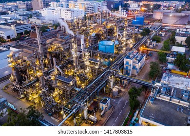 Tai Po, Hong Kong 19 May 2019: Top view of Hong Kong industrial factory plant at night - Shutterstock ID 1417803815