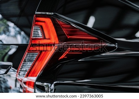 tail light of black SUV car. 