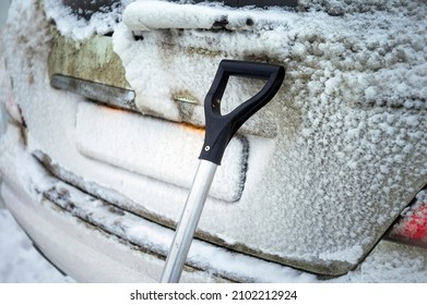 Tail Lights And Car Rear Door Covered Wth Snow, Winter Scene