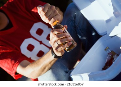 Tailgate: Fan Cracking Open Cold Beer At Party