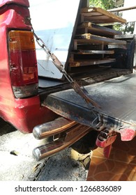 Tailgate Lid Of  The Old Red Pickup Truck
