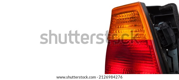 A taillight
of a stop signal for a German auto - optical equipment of white and
red color on a white isolated background. A spare part for repair
and sale in a car service
center.