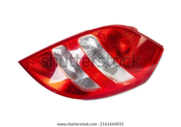 A taillight\
of a stop signal for a German auto - optical equipment of white and\
red color on a white isolated background. A spare part for repair\
and sale in a car service\
center.