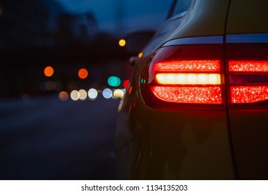 Taillight Of A Yellow Taxicar In The Night In Stockholm. Taken In Stockholm 2018-06-10