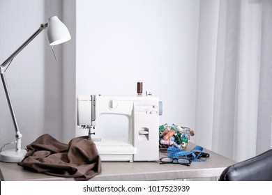 Tailor Desk With Modern Sewing Machine