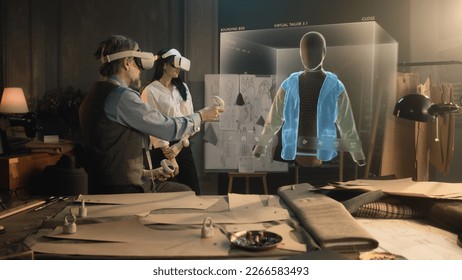 Tailor and female customer put VR goggles in atelier workshop. 3D hologram of jacket pattern. Virtual interface menu of program for designing and modeling clothes. Technologies of augmented reality. - Powered by Shutterstock