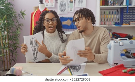 In a tailor shop, a man and woman designer team excitedly discuss fashion sketches, surrounded by sewing materials and a mannequin. - Powered by Shutterstock