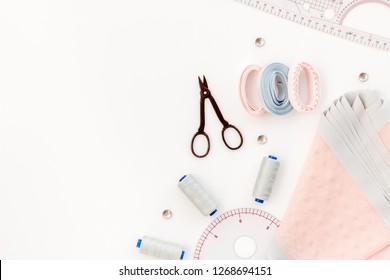 Tailor Shop With Thread, Scissors, Fabric. Sewing As Hobby. White Background Top View Mockup