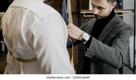  Tailor Taking Measurements For A Man Suit.  Bearded Fashion Designer In Atelier