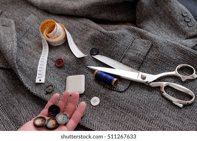 Tailor tools isolated on textile background