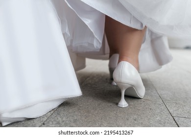 Tailored Heel. Back View Of The Bride's Shoes