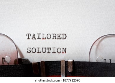 Tailored Solution Phrase Written With A Typewriter.