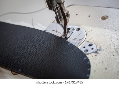 Tailoring Of Leather Products. Repair Of The Car Seat Cover.