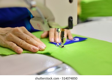 Tailoring Process - Women's Hands Behind Her Sewing