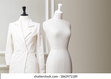 Tailor's textile mannequin in clothes designer show room - Powered by Shutterstock