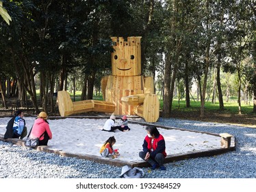 Tainan City,Taiwan - Feb 28th,2020 :  Sandpit And Gaint Wood Man At Tainan SHAN-SHANG Garden And Old Waterworks Museum