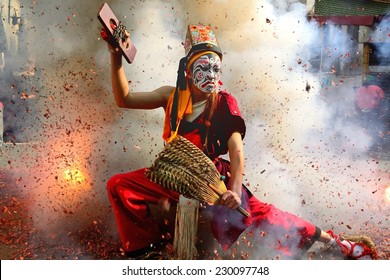 TAINAN, TAIWAN - Jan 5 : Eight Generals sat in the firecracker performances on Jan 5, 2014 in TAIPEI. Every two years, White Dragon Temple parade, traditional performing arrays in the streets